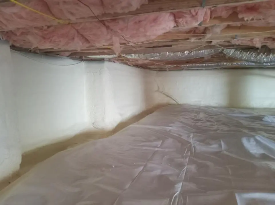 Crawl space encapsulation with closed-cell spray foam for Storm Damage Roof Repair in Benson